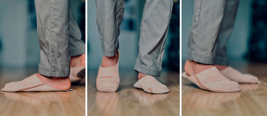 Man wearing premium leather slippers at home