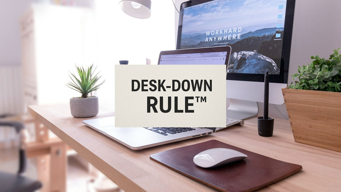 Minimalist home office with natural light, clean desk, and Desk-Down Rule™ method.