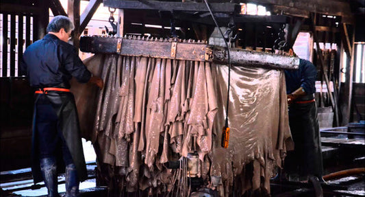 Rolls of Himeji sun-bleached white leather drying by the river